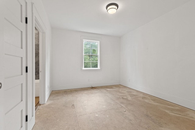 empty room with baseboards