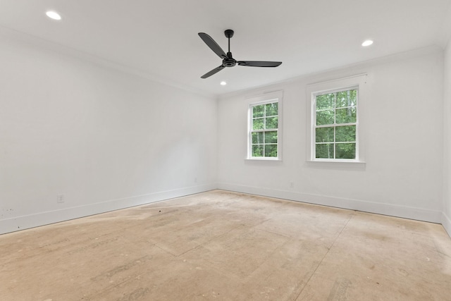 unfurnished room featuring baseboards, a ceiling fan, concrete floors, recessed lighting, and crown molding