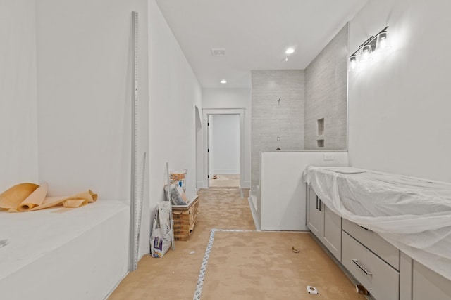 full bathroom with a walk in shower and recessed lighting