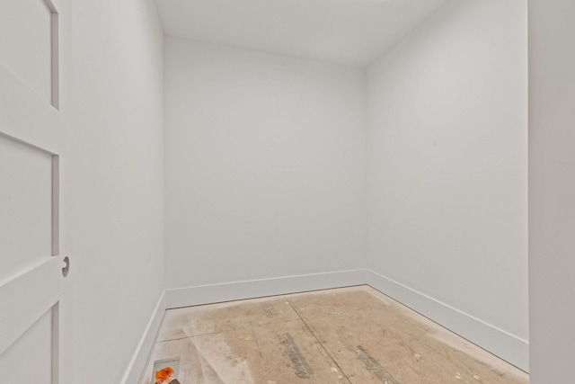 empty room with baseboards