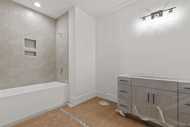 full bath with baseboards, shower / bath combination, and recessed lighting