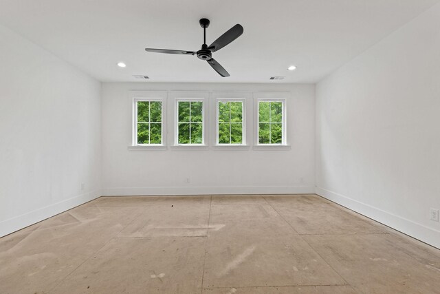 spare room with baseboards, healthy amount of natural light, ceiling fan, and recessed lighting