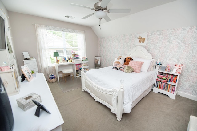 bedroom featuring wallpapered walls, vaulted ceiling, a ceiling fan, light carpet, and baseboards