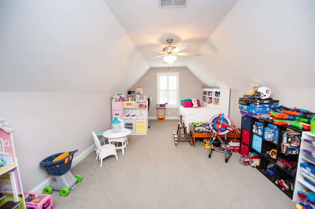 game room with vaulted ceiling, a ceiling fan, carpet flooring, and baseboards
