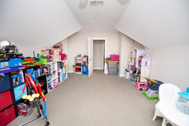 game room with lofted ceiling, a ceiling fan, carpet, and baseboards