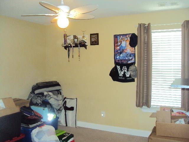 474 Slate, Boiling Springs, SC 29316 - interior space featuring baseboards, ceiling fan, and carpet floors