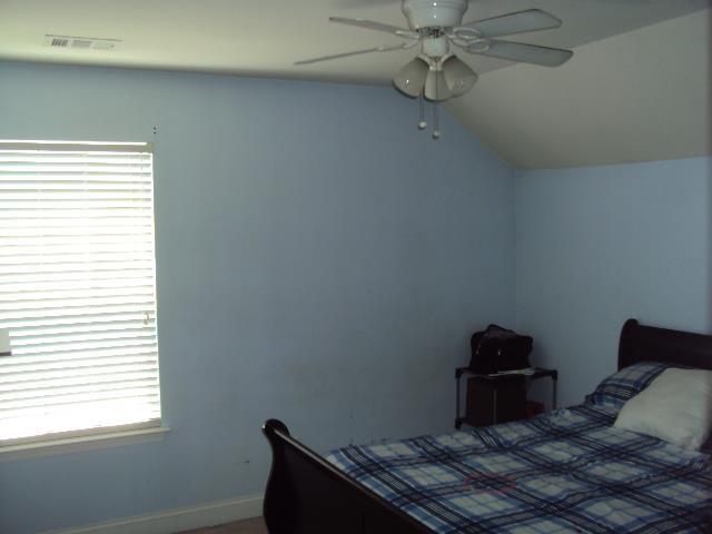 474 Slate, Boiling Springs, SC 29316 - bedroom featuring vaulted ceiling, ceiling fan, and baseboards