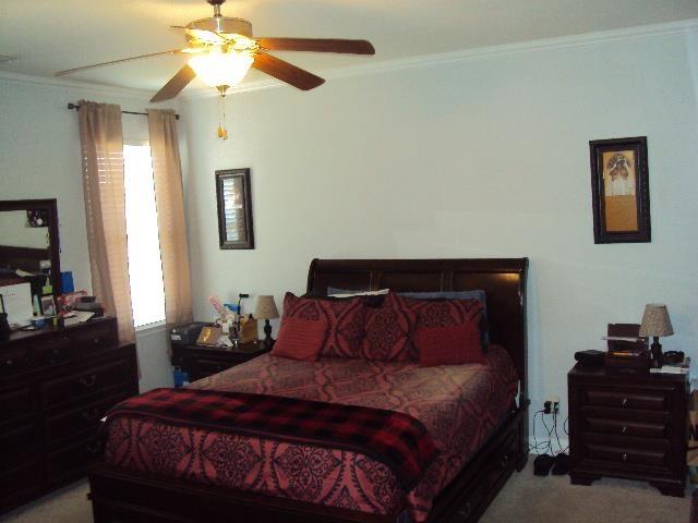 474 Slate, Boiling Springs, SC 29316 - bedroom featuring crown molding, carpet floors, and ceiling fan