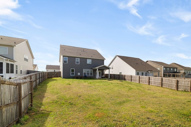 back of property with a residential view