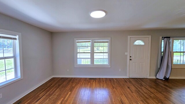 203 N Evans, Union, SC 29379 - entrance foyer with baseboards and dark wood-style flooring