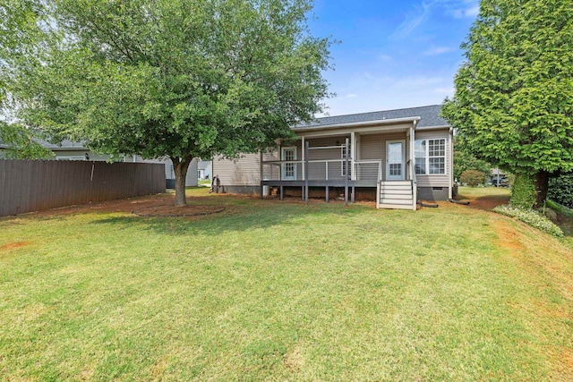 view of yard featuring a wooden deck