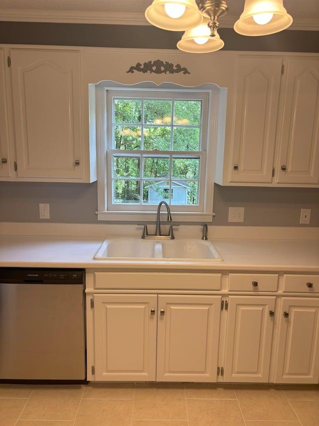 kitchen featuring dishwasher, a sink, white cabinets, light tile patterned floors, and crown molding