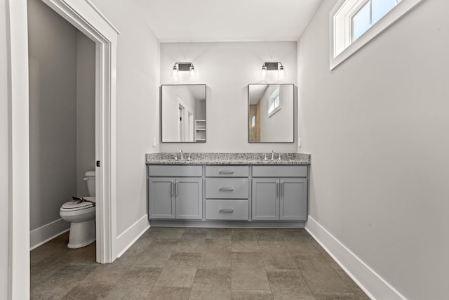 1313 S Pinot, Duncan, SC 29334 - full bath featuring toilet, baseboards, and double vanity