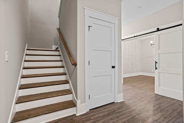 1305 S Pinot, Duncan, SC 29334 - stairs with a barn door, wood finished floors, and baseboards