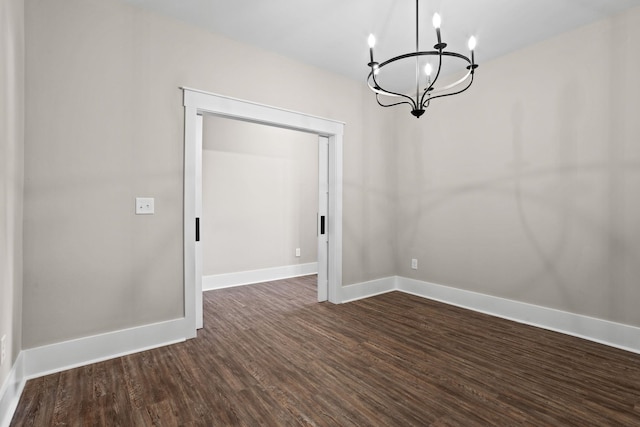1305 S Pinot, Duncan, SC 29334 - unfurnished dining area with a chandelier, dark wood-style floors, and baseboards