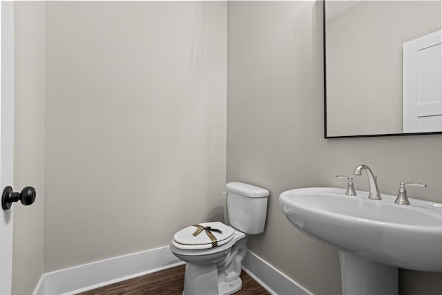 1305 S Pinot, Duncan, SC 29334 - bathroom featuring wood finished floors, a sink, baseboards, and toilet