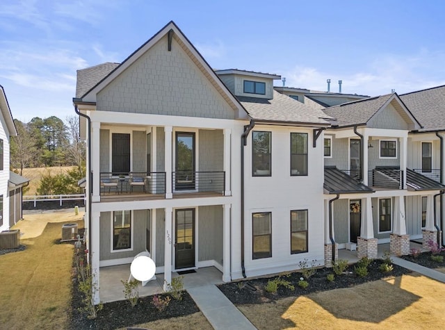 1200 N Pinot, Duncan, SC 29334 - view of front of house featuring a balcony, central air condition unit, and roof with shingles