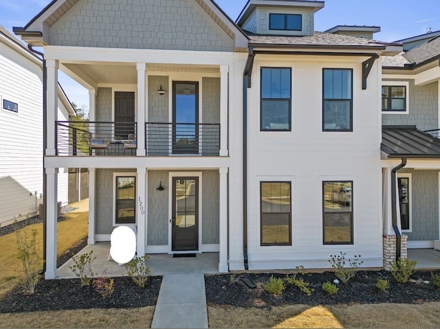 1200 N Pinot, Duncan, SC 29334 - view of front of house featuring a balcony and a porch