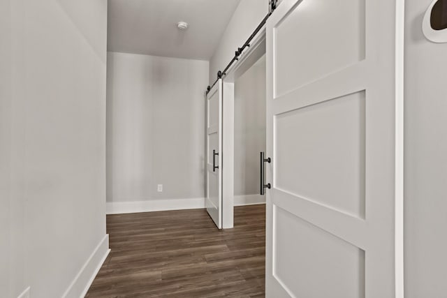 1208 N Pinot, Duncan, SC 20334 - corridor featuring a barn door, dark wood-style floors, and baseboards