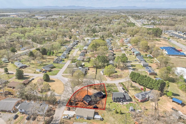 2 Willowood, Spartanburg, SC 29303 - aerial perspective of suburban area with property parcel outlined and a mountain backdrop