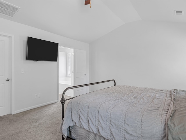 carpeted bedroom featuring vaulted ceiling, baseboards, and ceiling fan