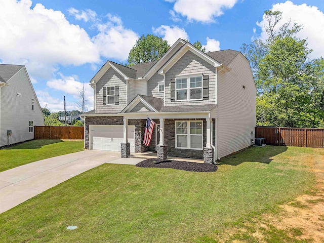 craftsman-style home with driveway, an attached garage, central air condition unit, and stone siding