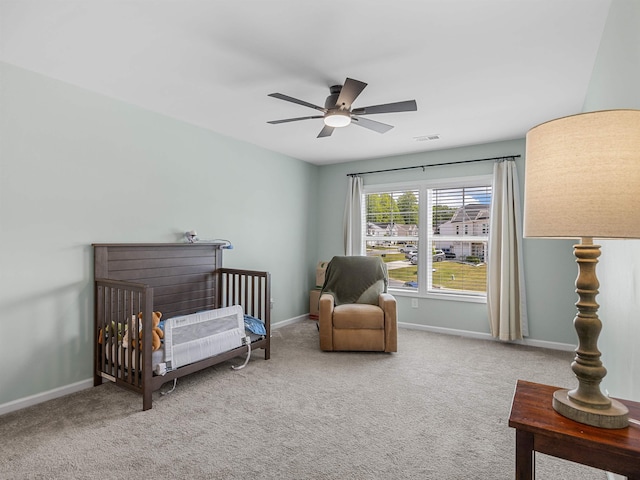 bedroom featuring carpet, baseboards, and ceiling fan