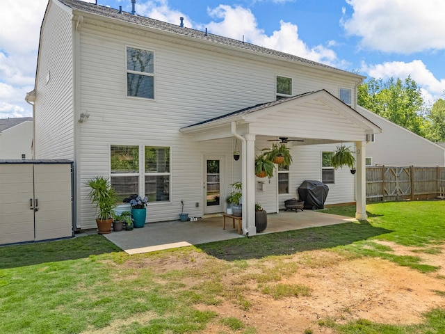 back of house featuring ceiling fan and a patio area