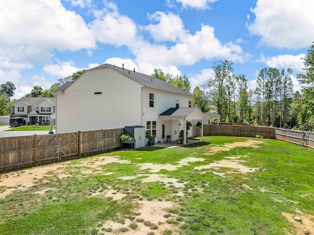 rear view of house featuring a patio area