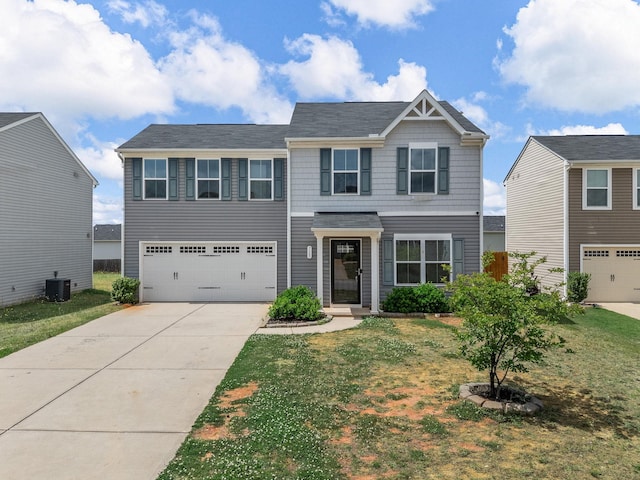 view of front facade featuring cooling unit, driveway, an attached garage, and a front lawn