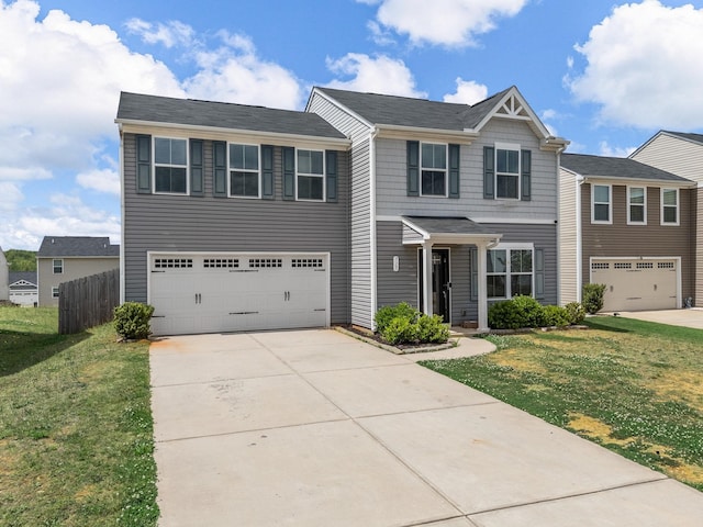 view of front of property with driveway and an attached garage