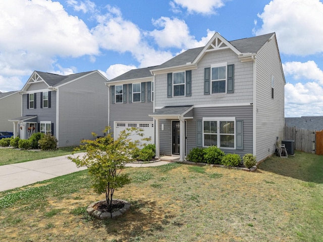 view of front of home with concrete driveway, central AC unit, and a garage