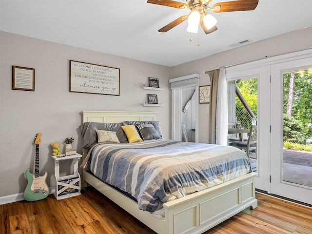 702 Lakewinds, Inman, SC 29349 - bedroom featuring access to exterior, light wood finished floors, ceiling fan, and baseboards