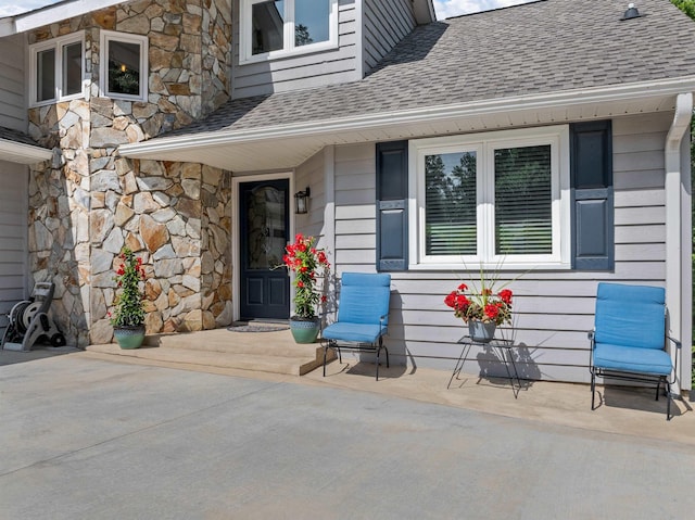 702 Lakewinds, Inman, SC 29349 - property entrance with roof with shingles and stone siding