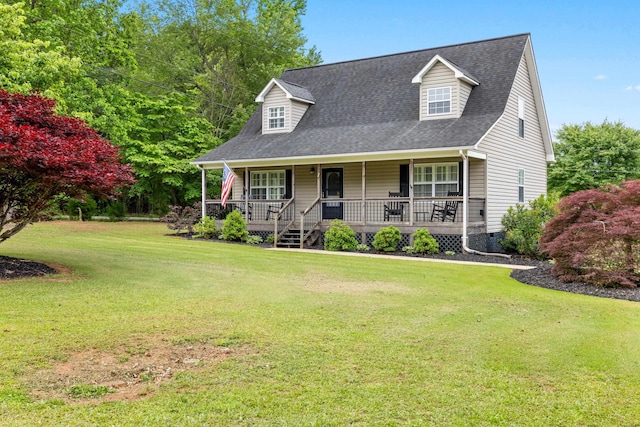 cape cod house featuring covered porch, a front lawn, and a shingled roof