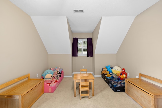 recreation room featuring carpet floors, baseboards, and lofted ceiling