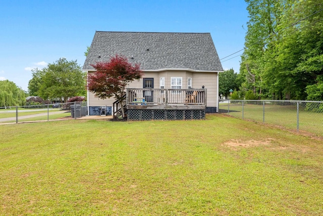 back of property with a wooden deck