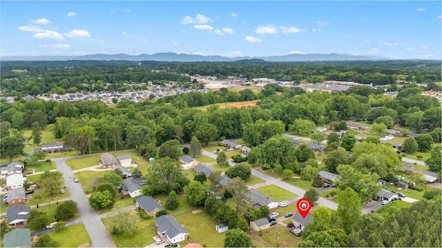 aerial perspective of suburban area featuring a mountainous background