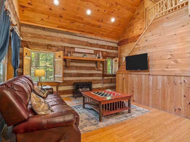 18 Lennox, Landrum, SC 29356 - living room featuring wooden walls, wooden ceiling, wood finished floors, recessed lighting, and a wood stove