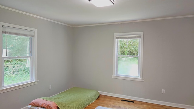 311 Hart, Union, SC 29379 - bedroom with wood finished floors, ornamental molding, and baseboards