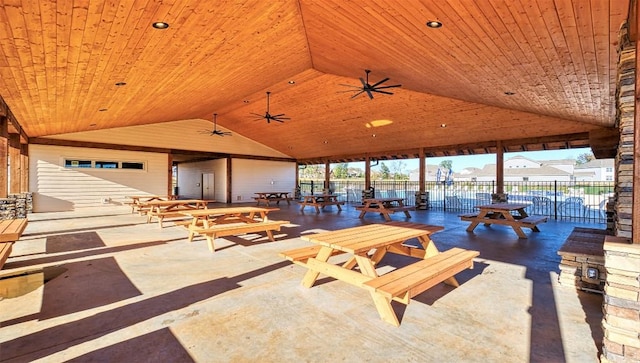 view of patio featuring fence and a ceiling fan