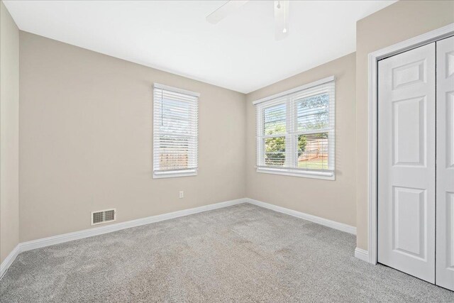 222 Woodview, Spartanburg, SC 29306 - unfurnished bedroom featuring carpet floors, baseboards, and a closet