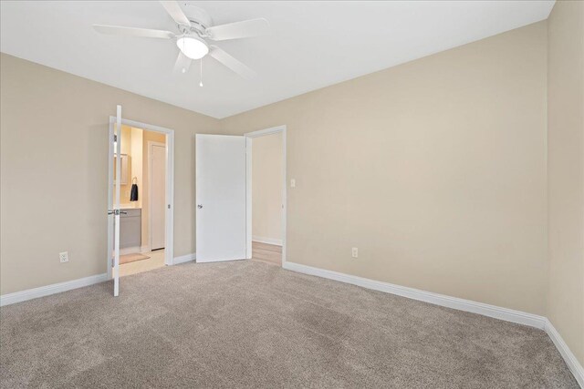 222 Woodview, Spartanburg, SC 29306 - unfurnished bedroom featuring light colored carpet, baseboards, and ensuite bath