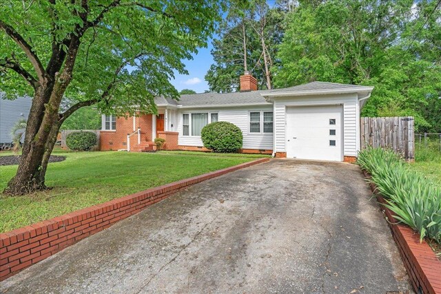 222 Woodview, Spartanburg, SC 29306 - single story home with asphalt driveway, crawl space, a chimney, and a garage