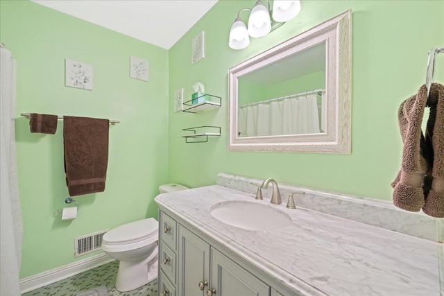 222 Woodview, Spartanburg, SC 29306 - bathroom featuring vanity, toilet, and baseboards