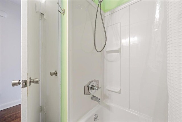 222 Woodview, Spartanburg, SC 29306 - full bath with shower / bathtub combination with curtain, wood finished floors, and baseboards