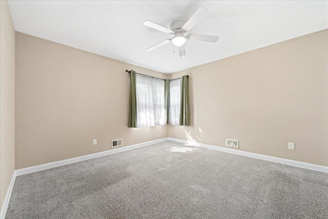 222 Woodview, Spartanburg, SC 29306 - carpeted empty room with baseboards and a ceiling fan