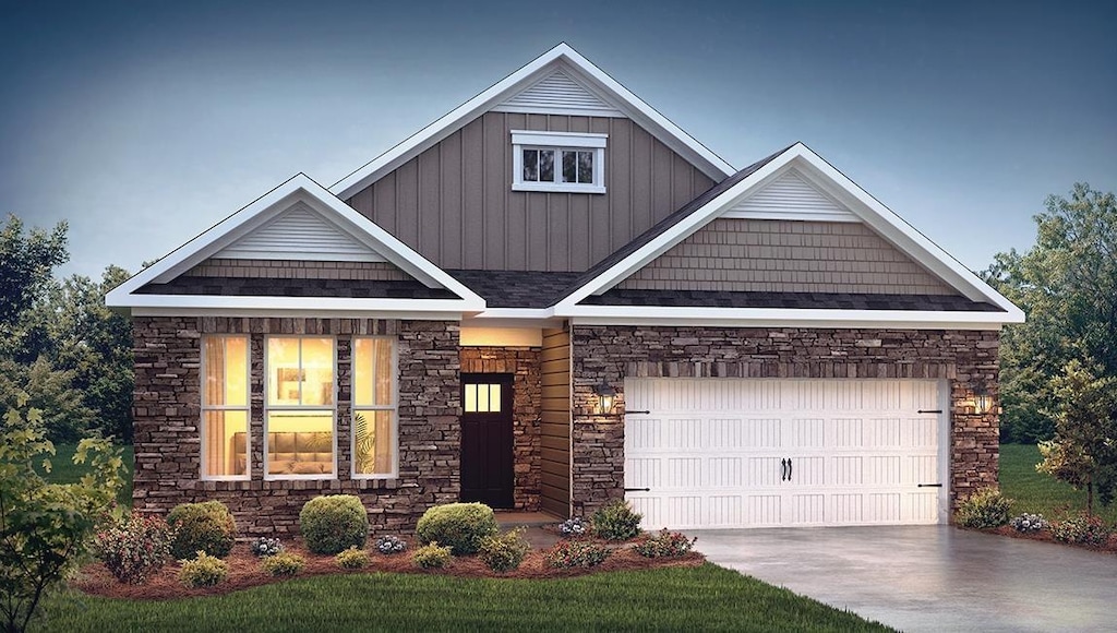 428 Barred Owl, Travelers Rest, SC 29690 - craftsman-style house with board and batten siding, stone siding, driveway, and a garage
