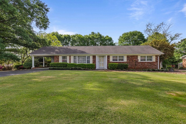8 Montford, Boiling Springs, SC 29316 - single story home with driveway, a front yard, brick siding, and a carport