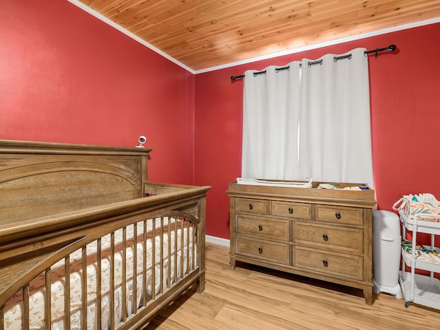 250 E Blackstock, Enoree, SC 29335 - bedroom featuring ornamental molding, light wood finished floors, wooden ceiling, and baseboards